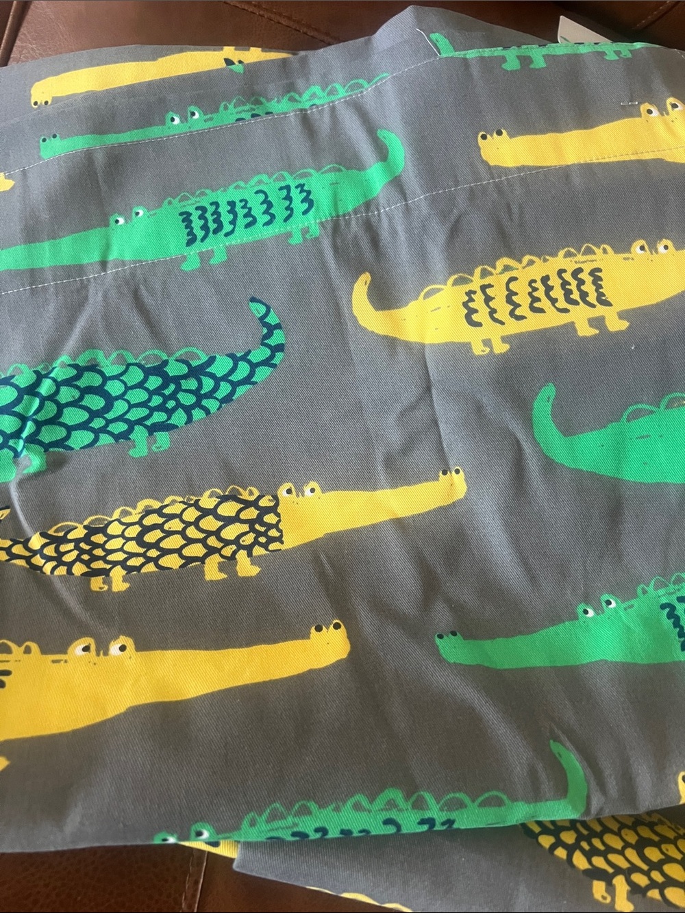 Pillowfort lined Curtain Panels with Yellow and Green Alligator Print.